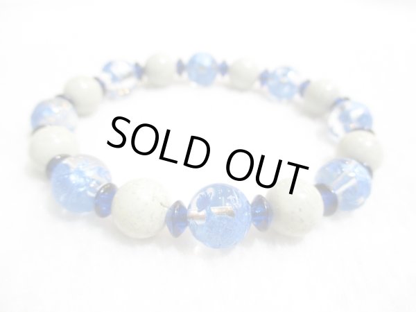 画像1: パワーストーン・京都/【最強金運・商売繁盛、必勝祈願、恋愛成就、生命力、健康、奇跡】【龍神】彫刻【本水晶】８玉(八大龍王神)【北投石】【そろばん珠(草木染めリトアニア産天然サファイアブルーアンバー)】ブレスレット、桐箱付き【伏見の京屋】 (1)